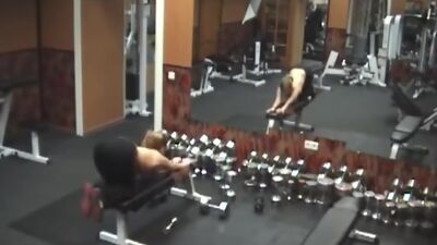 Stripping gal caught by security cam in the gym!