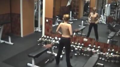 Stripping gal caught by security cam in the gym!