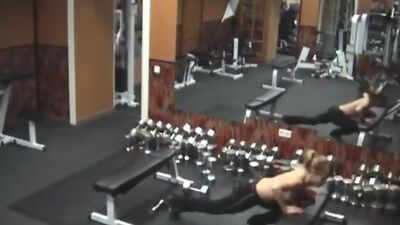 Stripping gal caught by security cam in the gym!