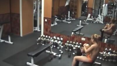 Stripping gal caught by security cam in the gym!