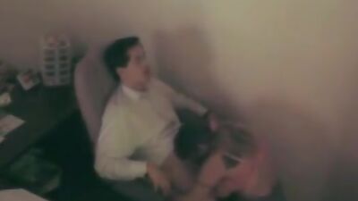 Busty doll deeply swallowing stiff member!