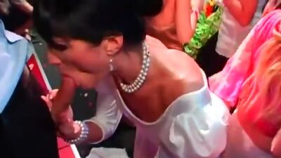 DRUNKSEXORGY - Horny brunette bride eats a big cock in public