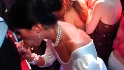DRUNKSEXORGY - Horny brunette bride eats a big cock in public