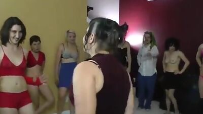 LOSTBETSGAMES - Group of people play a game of strip rock, paper, scissors