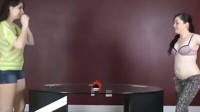 LOSTBETSGAMES - Two pretty girls play a strip air hockey game