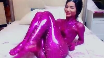 Babe in purple body paint on webcam