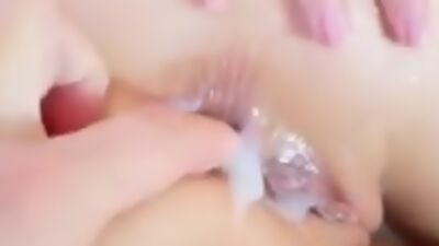 skinny blonde in red latex suit