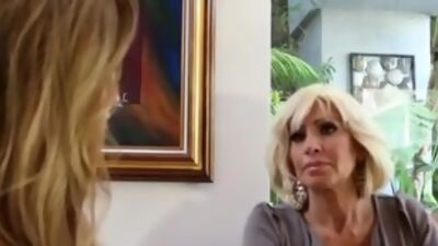 A lesbian cougar and a MILF have lesbo sex