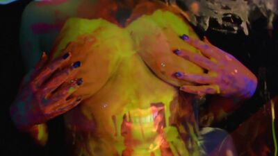 Busty Natasha Shoots A Fun And Sexy Black Light video