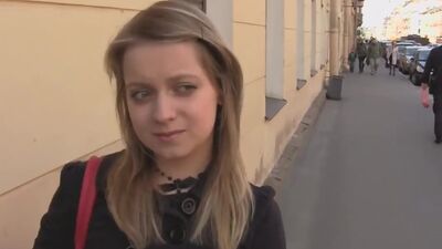 A blue-eyed chick, shy but interested!