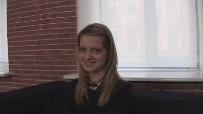 A blue-eyed chick, shy but interested!