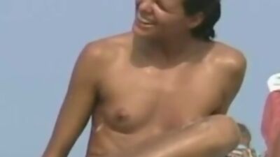 Cute naked brunette exposes her pussy to spy camera