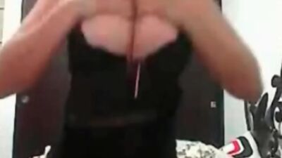 Big tits brunette posing for the cam in sexy lingerie