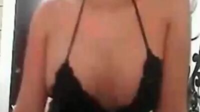 Big tits brunette posing for the cam in sexy lingerie