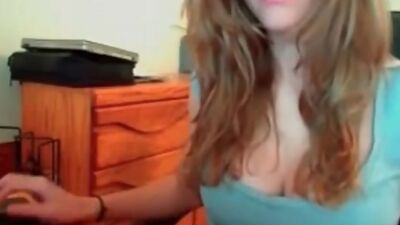 Girlfriend shows her fake tits on webcam