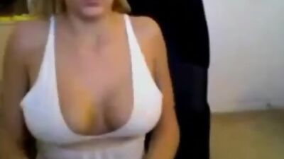 Blonde girl shows her big tits on webcam