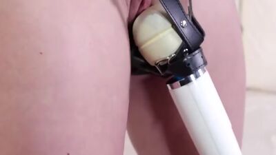 Busty milf strapped with vibrator