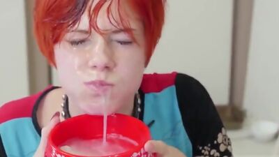 Redhead slut drinks cum and licks man's ass