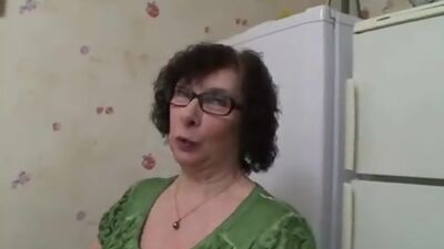 Busty Granny in Stockings and Glasses Fucks