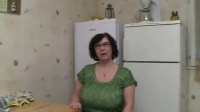 Busty Granny in Stockings and Glasses Fucks