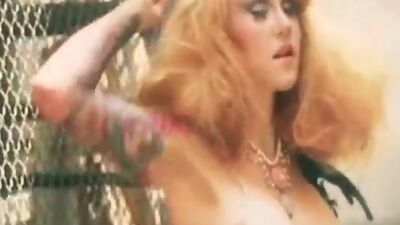 See Chesty show off her tattoos.