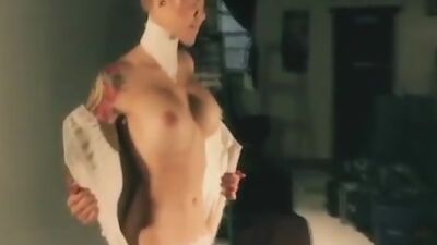 See Chesty show off her tattoos.