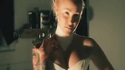 See Chesty show off her tattoos.