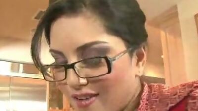 Sunny Leone plays with her clit.