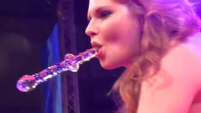 Busty lady playing with slit