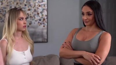 Teacher Sheena Ryder helps her student Lilly Bell
