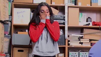 Suspect is an adolescent Latina female with dark hair. Perp is suspected of having hidden multiple items from the cash wrap in her personal bag