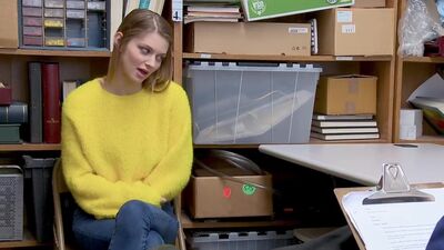 Female suspect apprehended and detained on suspicion of shoplifting, having hidden items under her sweater