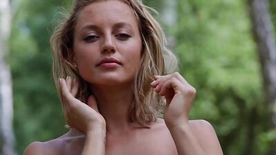 Gorgeous all natural blonde MILF models striptease naked outdoor