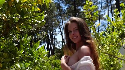 Petite blonde teen Hailey Afton strips naked for Playboy in a store