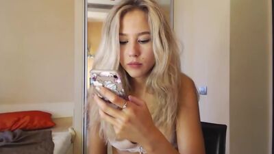Blonde Chick having fun stripping for you