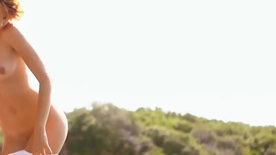 Small tits model Ariel posed totally naked outdoor and she exposed her body