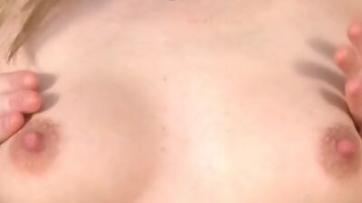 Julianna shows a 'no panties upskirt'. She undresses and caresses her boobs.