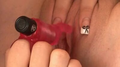 A beautiful clit licking scene as Angel teases Kattie's erect clit with the Rabbit vibrator.