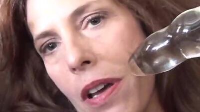 Gorgeous mature redhead fucks her pussy and asshole